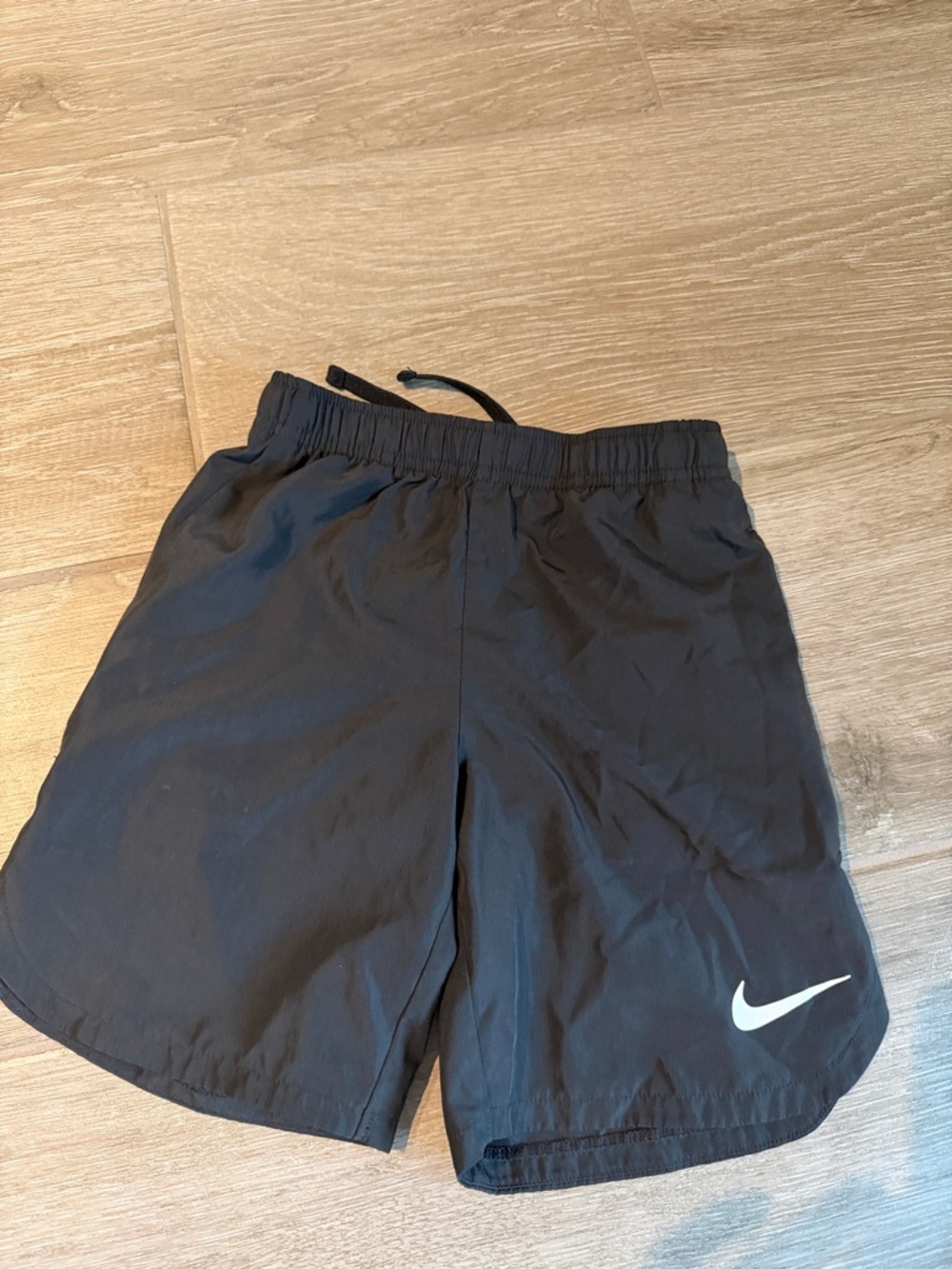 Nike Black Shorts with White Swoosh Logo